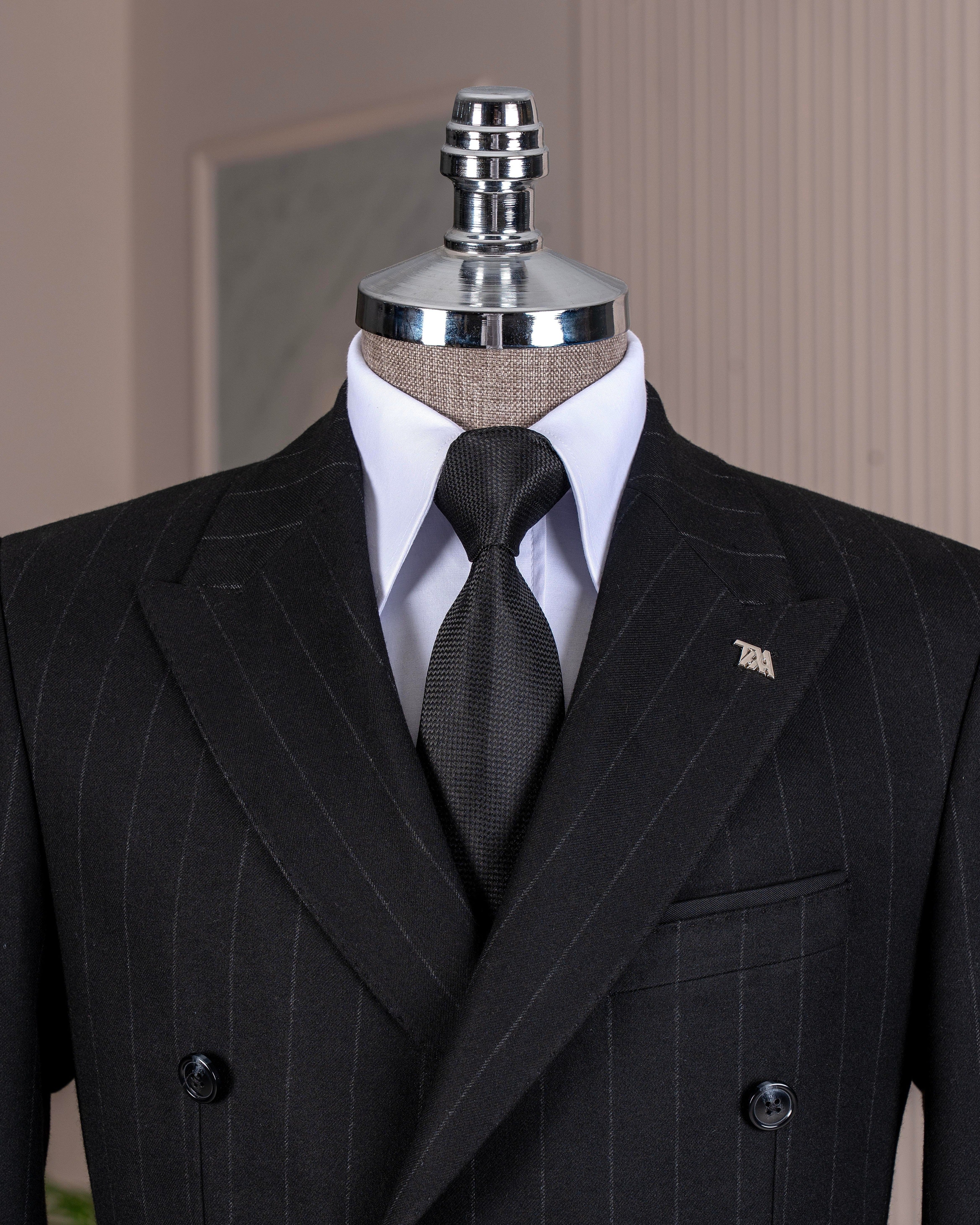 Close-up of a black stripe suit with a white French Cuff Shirt, 